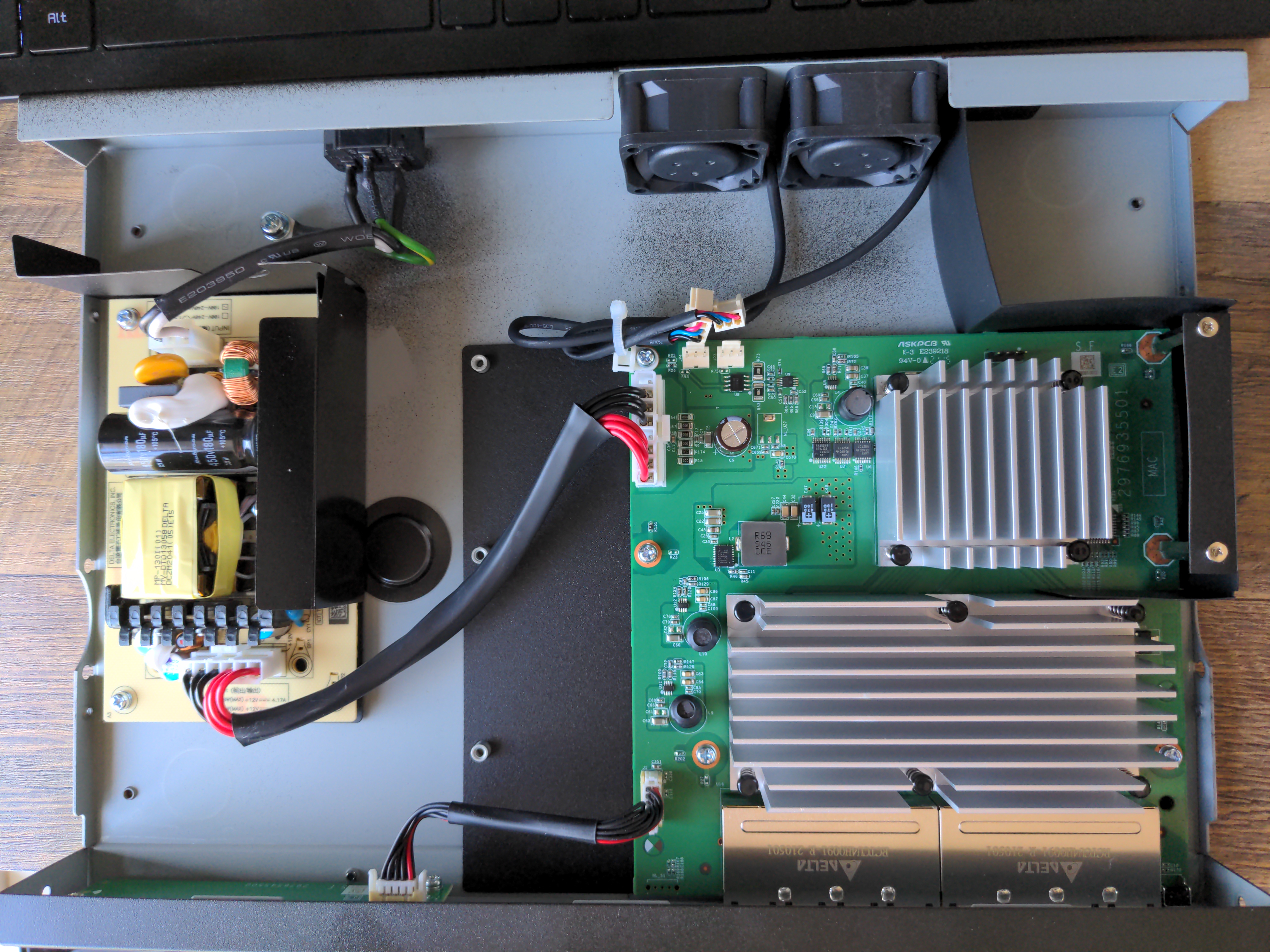 PIcture of the inside of the switch showing two small circuit boards and lots of empty space.