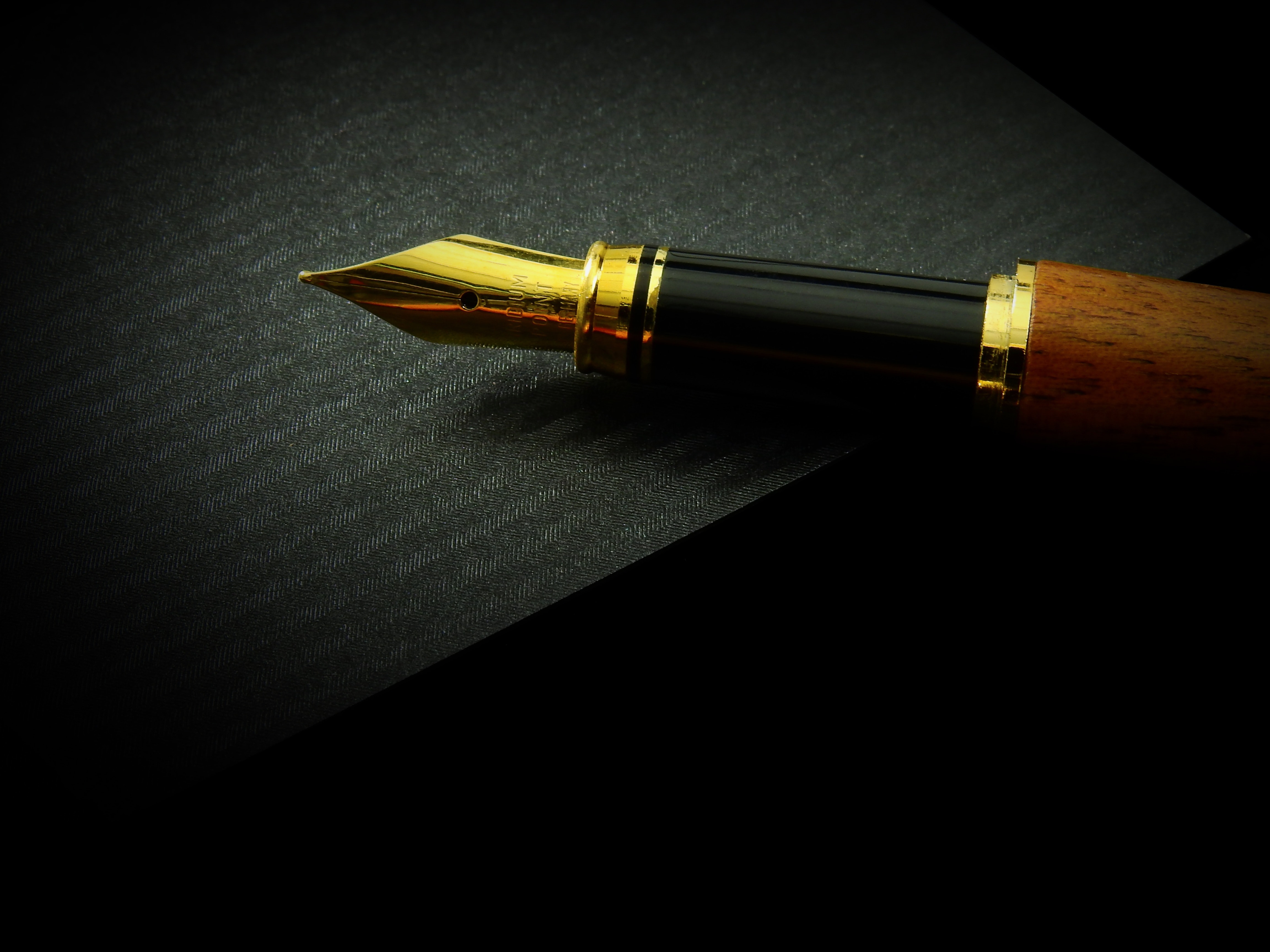 a gold fountain pen